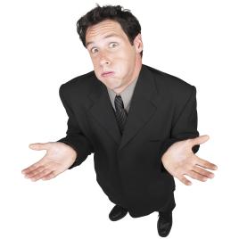 young-business-man-making-an-indecisive-expression-with-his-hands-2040003