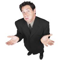 young-business-man-making-an-indecisive-expression-with-his-hands-2040003
